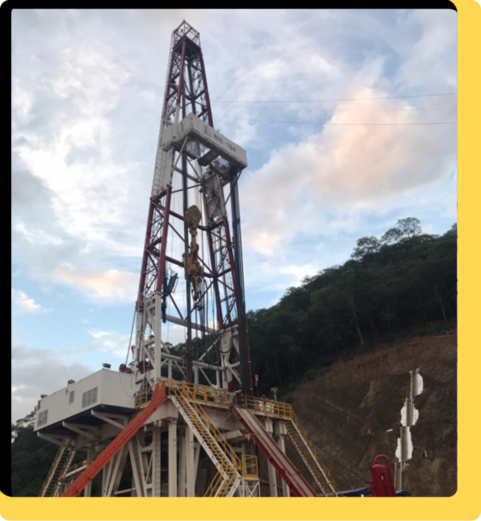 An image of an oil rig In the mountains